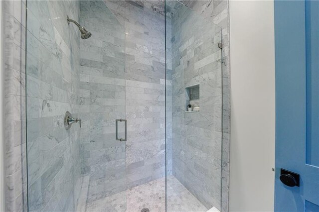 bathroom featuring walk in shower