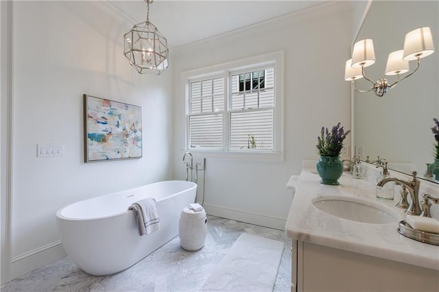 bathroom featuring a tub to relax in, vanity, a chandelier, and ornamental molding