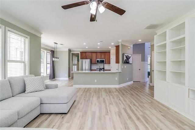 95 Jeffco Dr, Jefferson, GA 30549 - living area with ornamental molding, ceiling fan, light wood-type flooring, baseboards, and recessed lighting