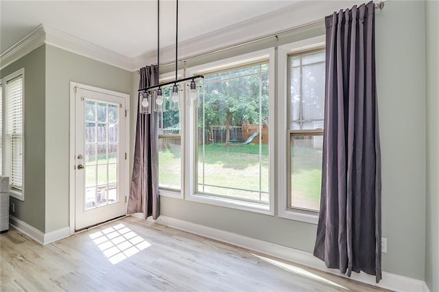 95 Jeffco Dr, Jefferson, GA 30549 - unfurnished dining area with crown molding and wood finished floors