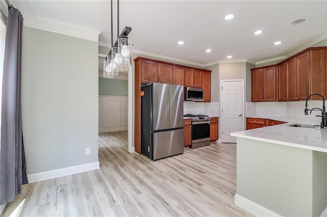 95 Jeffco Dr, Jefferson, GA 30549 - kitchen with stainless steel appliances, ornamental molding, recessed lighting, light wood-style flooring, and light countertops