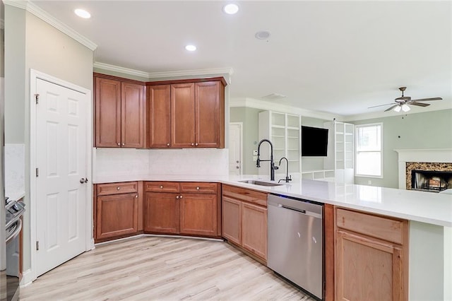 95 Jeffco Dr, Jefferson, GA 30549 - kitchen with stainless steel appliances, a sink, open floor plan, a peninsula, and a ceiling fan