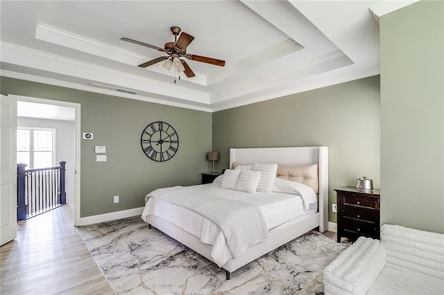 95 Jeffco Dr, Jefferson, GA 30549 - bedroom with a raised ceiling, ornamental molding, wood finished floors, baseboards, and ceiling fan