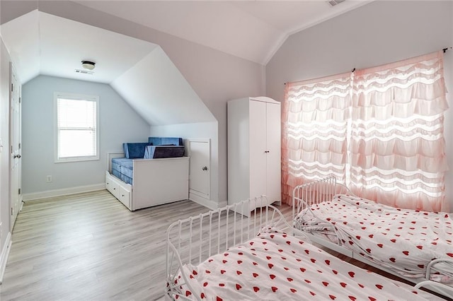 95 Jeffco Dr, Jefferson, GA 30549 - bedroom with lofted ceiling and wood finished floors