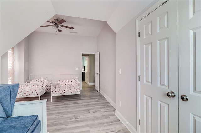 95 Jeffco Dr, Jefferson, GA 30549 - bedroom with lofted ceiling, light wood-style floors, baseboards, and a ceiling fan