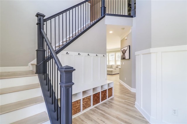 95 Jeffco Dr, Jefferson, GA 30549 - stairway featuring a high ceiling, wood finished floors, and baseboards