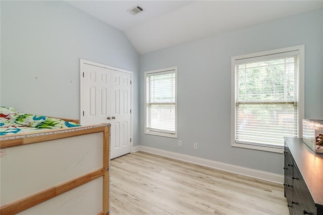 95 Jeffco Dr, Jefferson, GA 30549 - bedroom with vaulted ceiling, light wood-style floors, and a closet