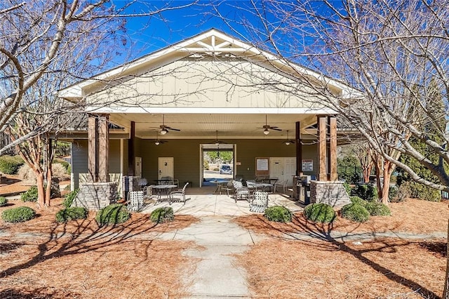 95 Jeffco Dr, Jefferson, GA 30549 - back of property with ceiling fan and a patio area