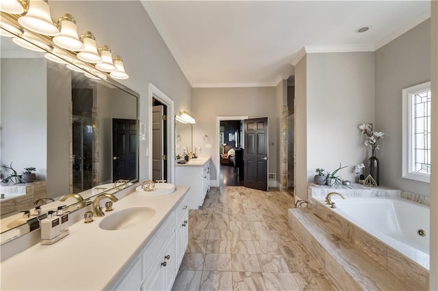 bathroom with vanity, ornamental molding, a stall shower, and a bath
