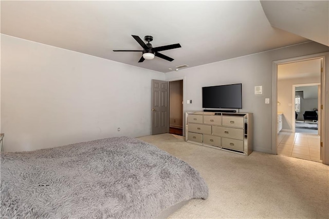 carpeted bedroom featuring visible vents and ceiling fan
