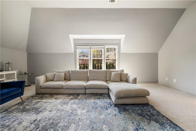 living room featuring baseboards, lofted ceiling, visible vents, and carpet floors