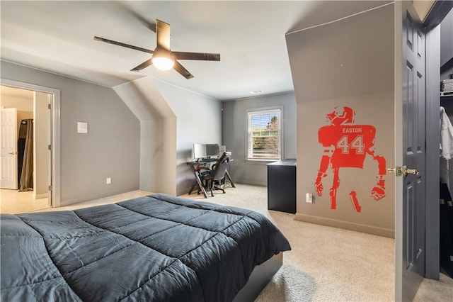 bedroom featuring a ceiling fan, baseboards, and light colored carpet