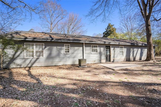 rear view of property featuring a patio area