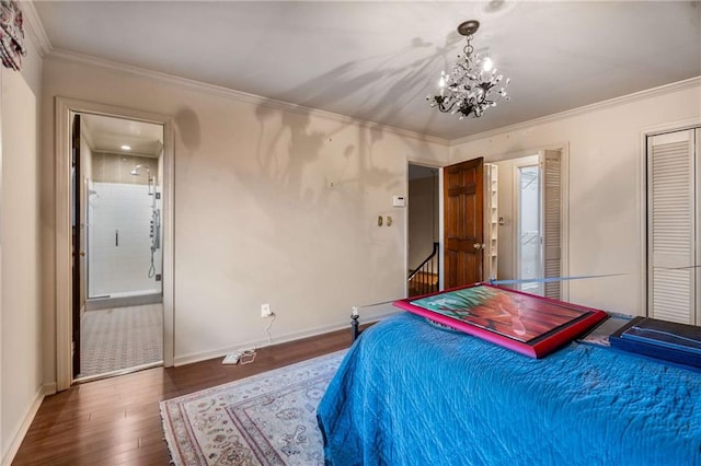 bedroom with a chandelier, ornamental molding, baseboards, and wood finished floors