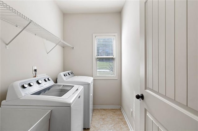 laundry area with washer and dryer