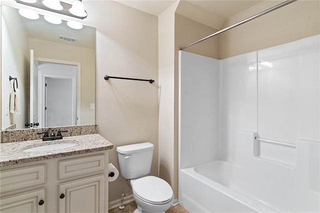 full bathroom featuring toilet, shower / bathing tub combination, and vanity