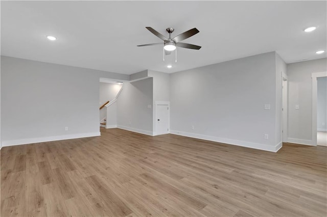 unfurnished room featuring ceiling fan and light hardwood / wood-style flooring