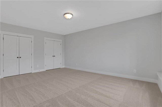 spare room with ceiling fan and light hardwood / wood-style flooring