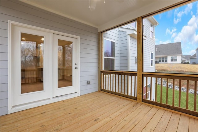 unfurnished sunroom with a wealth of natural light