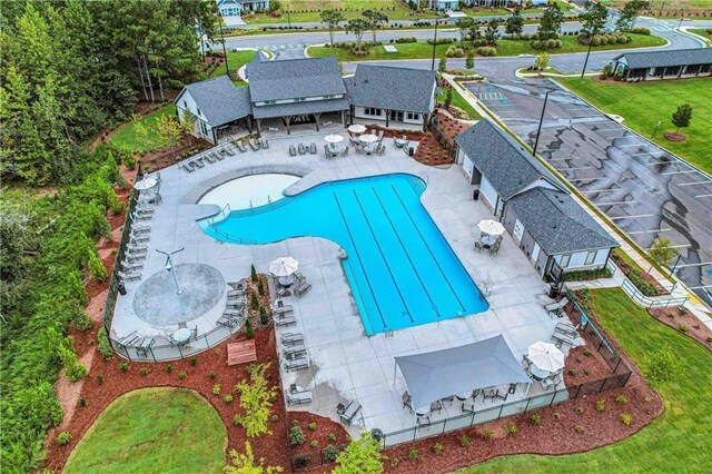 view of swimming pool with a patio area