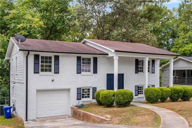 bi-level home featuring a garage