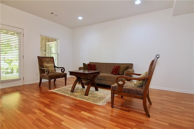 sitting room with light wood-type flooring