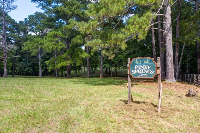 view of community with a yard