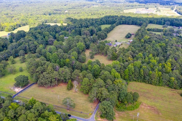 aerial view with a view of trees and a rural view