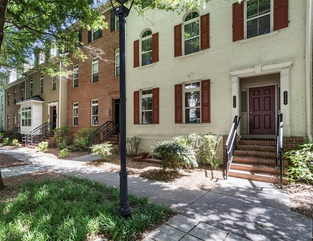 2728 Wander Ln, Alpharetta, GA 30022 - view of property with brick siding and entry steps