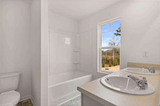 1410 Aura Ln, Lawrenceville, GA 30045 - bathroom featuring toilet, double vanity, and shower / bath combination