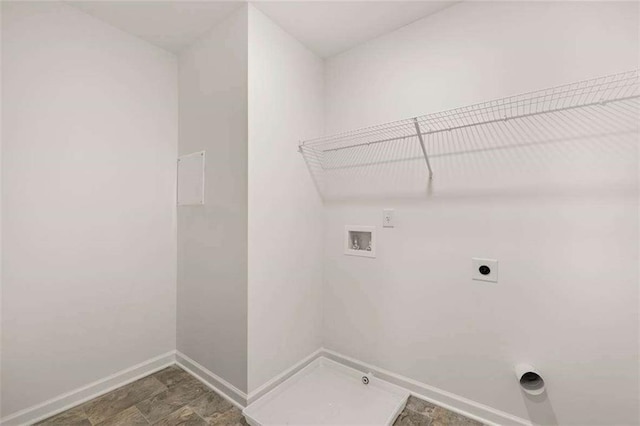 1410 Aura Ln, Lawrenceville, GA 30045 - laundry room with hookup for an electric dryer, hookup for a washing machine, baseboards, and hookup for a gas dryer