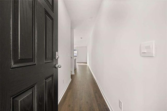1410 Aura Ln, Lawrenceville, GA 30045 - corridor with dark wood-type flooring and baseboards