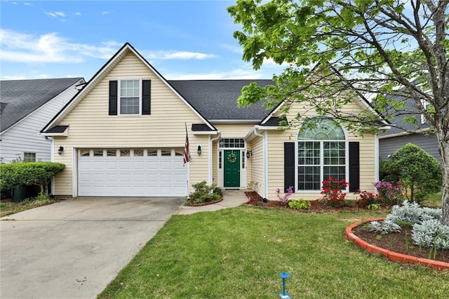 traditional-style home featuring a shingled roof, driveway, and a front yard