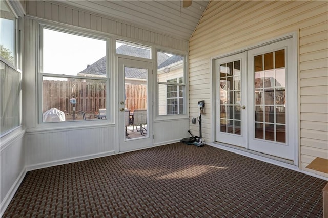 unfurnished sunroom featuring french doors