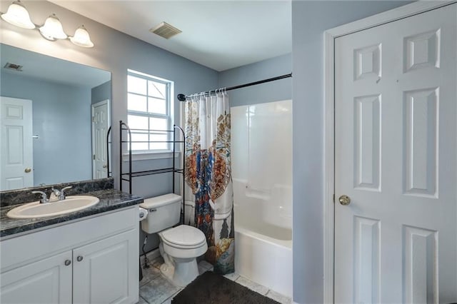 full bathroom with toilet, tile patterned floors, vanity, and visible vents