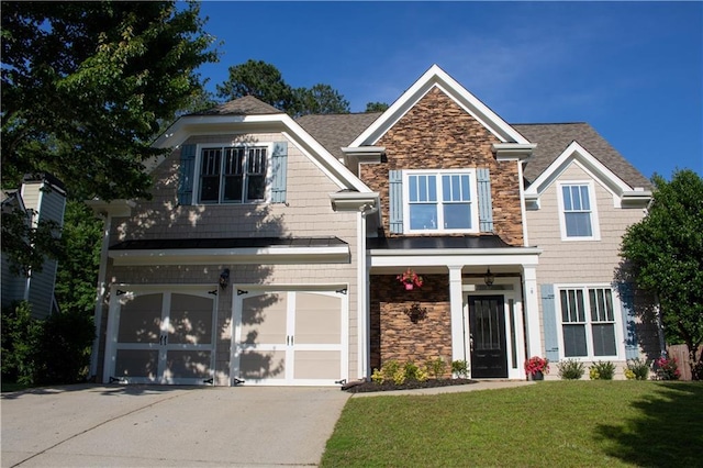 36 Evergreen Way, Dallas, GA 30157 - view of front facade with an attached garage, concrete driveway, stone siding, and a front lawn