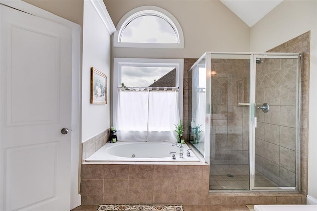 36 Evergreen Way, Dallas, GA 30157 - bathroom with a shower stall, a jetted tub, lofted ceiling, and tile patterned floors