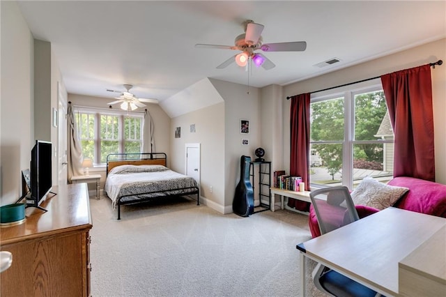 36 Evergreen Way, Dallas, GA 30157 - bedroom with multiple windows, light carpet, ceiling fan, and vaulted ceiling