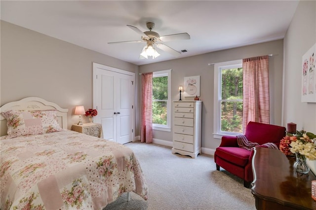36 Evergreen Way, Dallas, GA 30157 - bedroom with light carpet, ceiling fan, and a closet