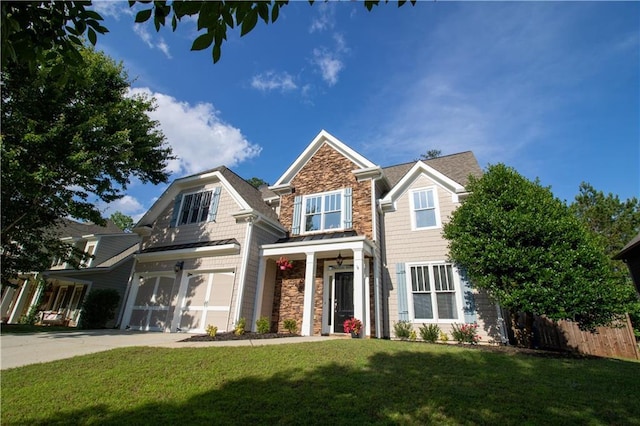 36 Evergreen Way, Dallas, GA 30157 - view of front facade featuring stone siding, concrete driveway, and a garage