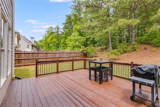36 Evergreen Way, Dallas, GA 30157 - wooden deck with outdoor dining area and a fenced backyard