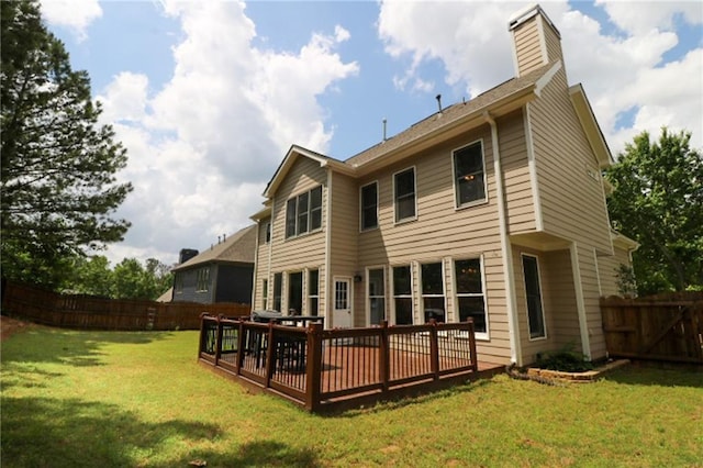 36 Evergreen Way, Dallas, GA 30157 - rear view of house with a fenced backyard, a chimney, and a wooden deck