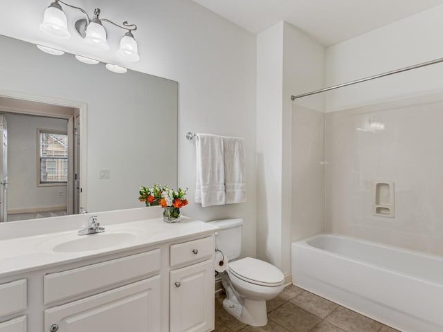 full bathroom with tub / shower combination, toilet, vanity, and tile patterned flooring