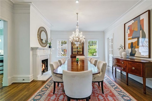 dining space with crown molding, a notable chandelier, and dark hardwood / wood-style floors