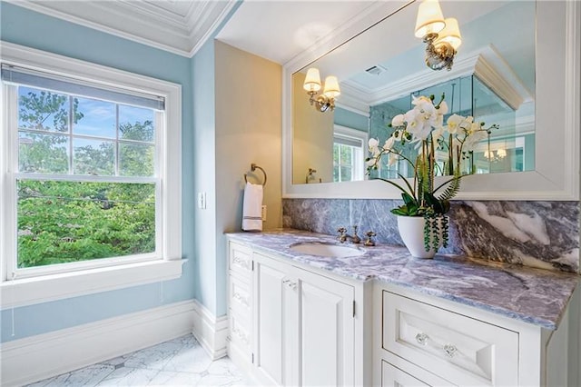 bathroom featuring backsplash, vanity, a chandelier, and tile flooring