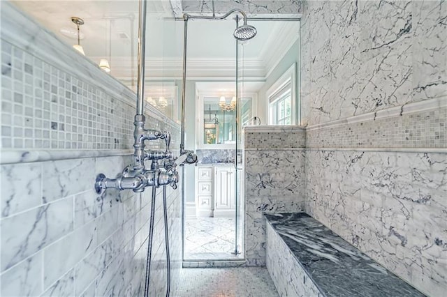 bathroom featuring tile walls, ornamental molding, tiled shower, and tile flooring