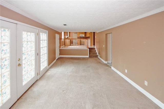 4161 Windermere Dr, Lithonia, GA 30038 - unfurnished living room featuring stairway, baseboards, visible vents, crown molding, and light colored carpet