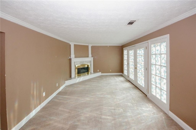4161 Windermere Dr, Lithonia, GA 30038 - unfurnished living room with visible vents, a textured ceiling, a fireplace, crown molding, and baseboards