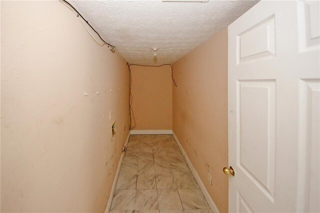 4161 Windermere Dr, Lithonia, GA 30038 - hallway featuring baseboards and a textured ceiling