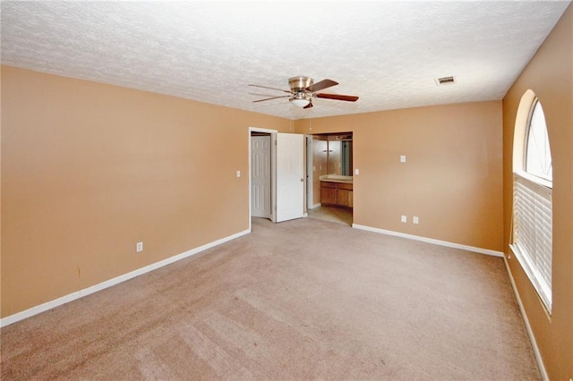 4161 Windermere Dr, Lithonia, GA 30038 - unfurnished room featuring baseboards, a textured ceiling, and a ceiling fan